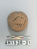 藏品(紅色粗砂陶鈕殘件)的圖片